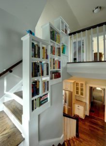 Staircase with a bookshelf built in used in the article How to Make Money With A Hobby.