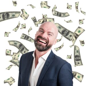 A laughing bearded man in a white shirt and coat, no tie, with lots of dollar bills falling around him in the background. Used in the article wealthy Affiliate Review with the URL Is wealthy Affiliate worth the money?