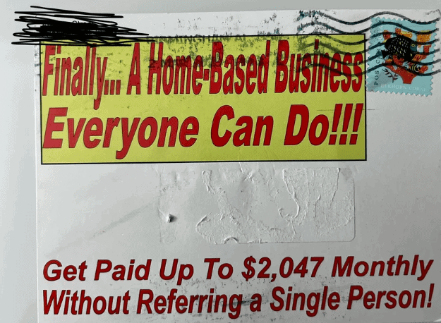A postcard with the address removed showing a banner with "Finally... A home Based Business Everyone can do" and at the bottom "Get Paid Up to $2,047 Monthly Without Referring a Single Person" Used in the article Are Things Going Sour for Livegood?