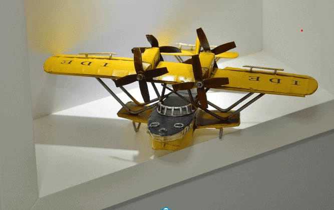 A yellow model plane sitting on a shelf. Used in the article 9 Affiliate secrets for Niche selection. 