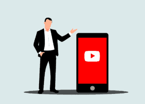 An image vector of a guy in a dark suit introducing a mobile phone with the U-tube logo. Used in the article, Avoiding affiliate marketing pitfalls.  